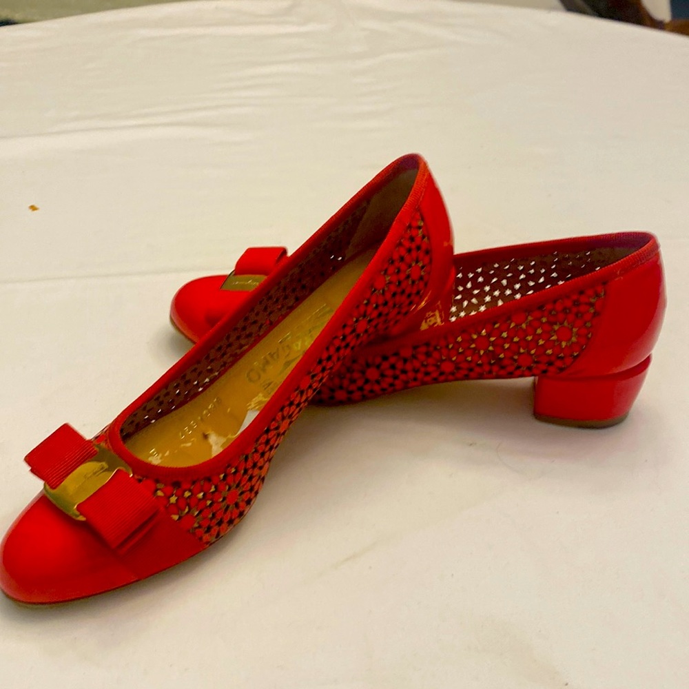 Red Ferragamo’s. Unique flower perforations in body. You’ll have so much fun
